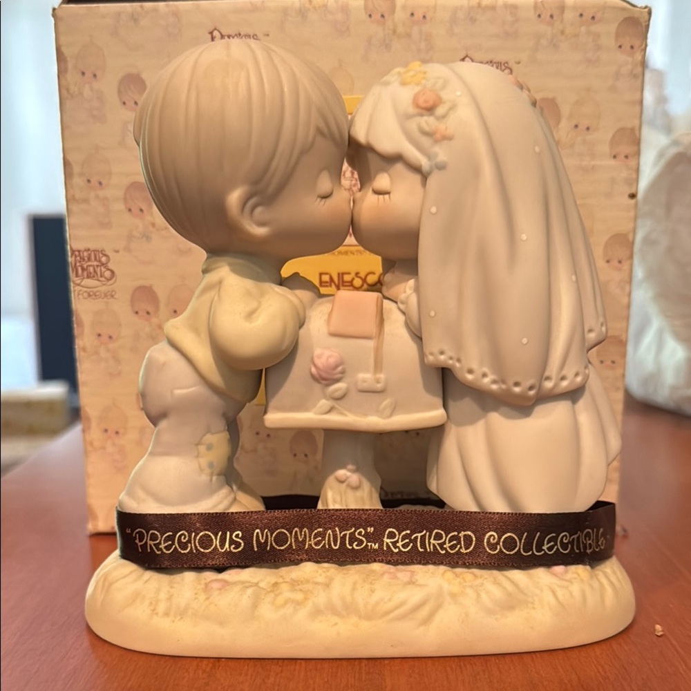 Precious Moments retired, sealed with a kiss